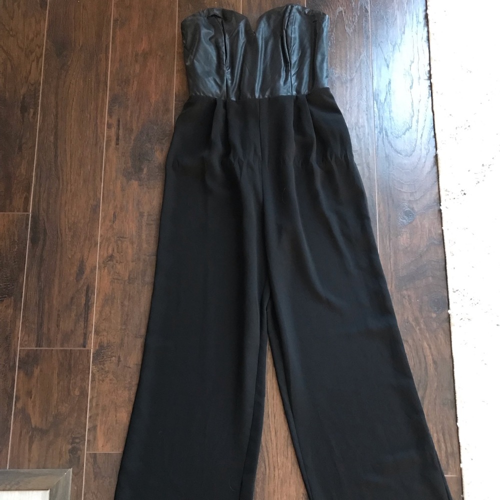 Black jumpsuit with leather sweetheart top